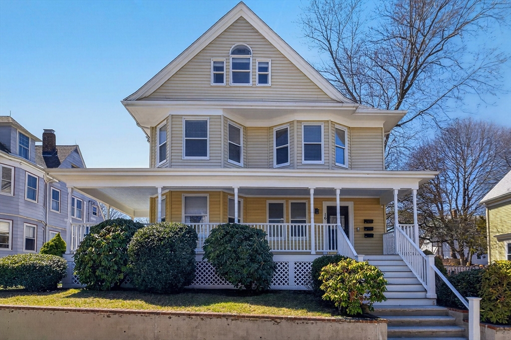 16 Primrose Street, Unit 3 Boston, MA 02131 - Photo 25 of 26 a front view of a house with a yard