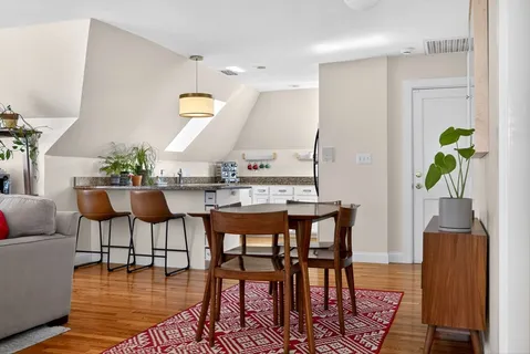 a view of a dining room with furniture