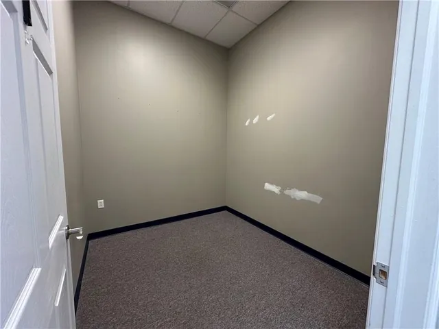 a view of a room with a bench