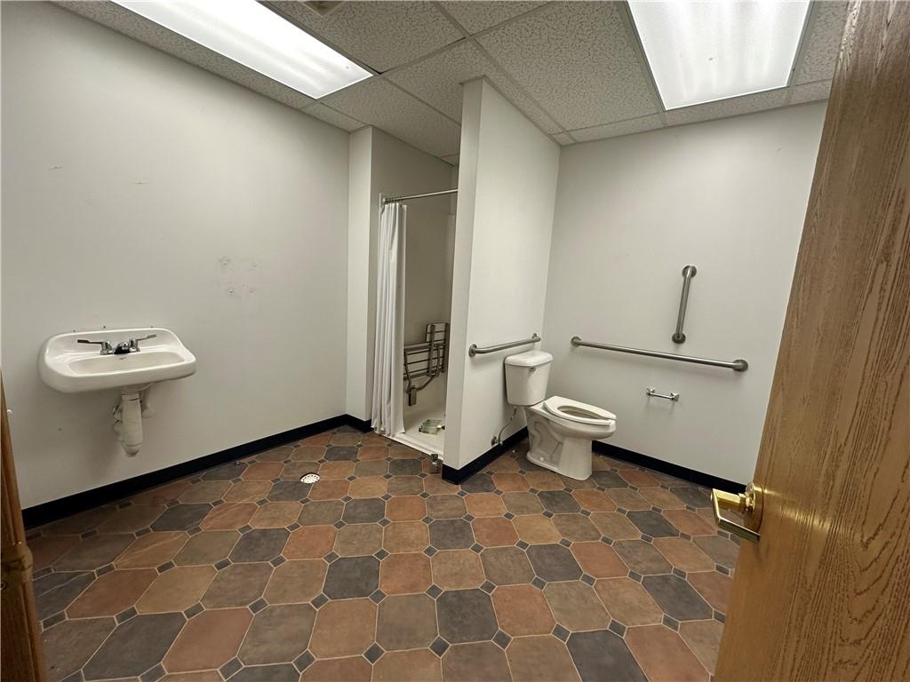 3379 Pittsburgh Street, Unit 109 Perryopolis, PA 15473 - Photo 18 of 30 a bathroom with a toilet