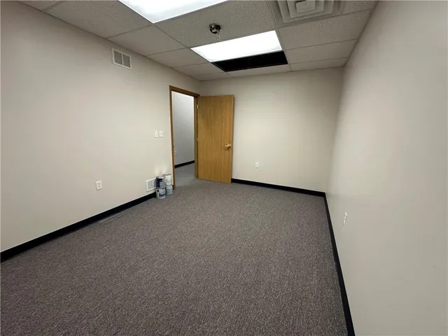 a view of a room with a hallway