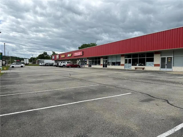a view of a building with a street