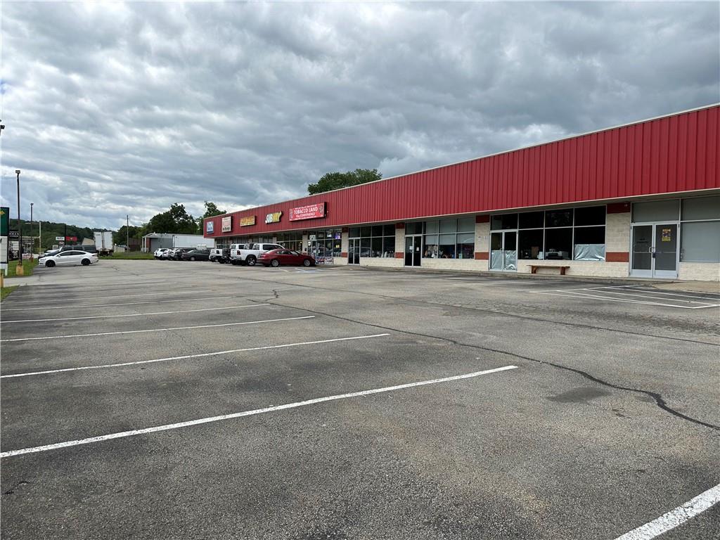 3379 Pittsburgh Street, Unit 109 Perryopolis, PA 15473 - Photo 4 of 30 a view of a building with a street