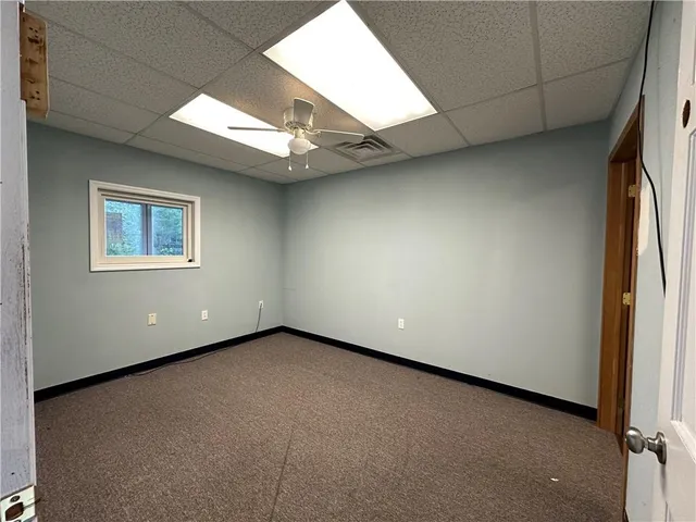 an empty room with windows