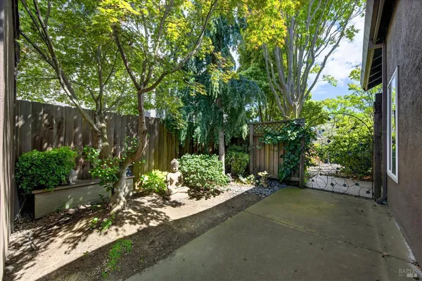 a backyard of a house with lots of green space