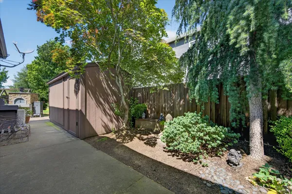 a backyard of a house with lots of green space