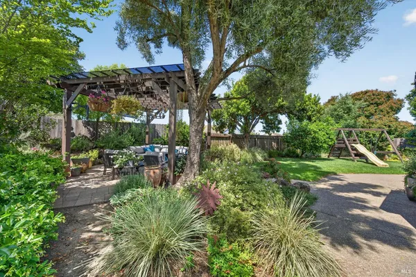 a garden view with a seating space