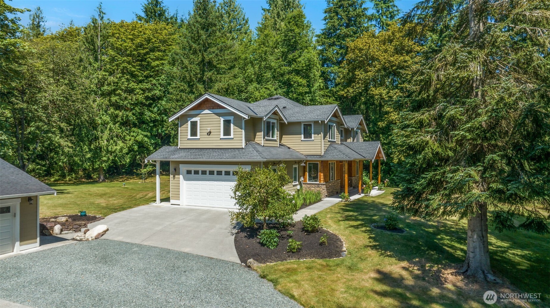 11212 Chain Lake Road Snohomish, WA 98290 - Photo 1 of 1 front view of a house with a yard
