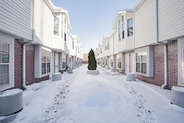 a view of a house with backyard