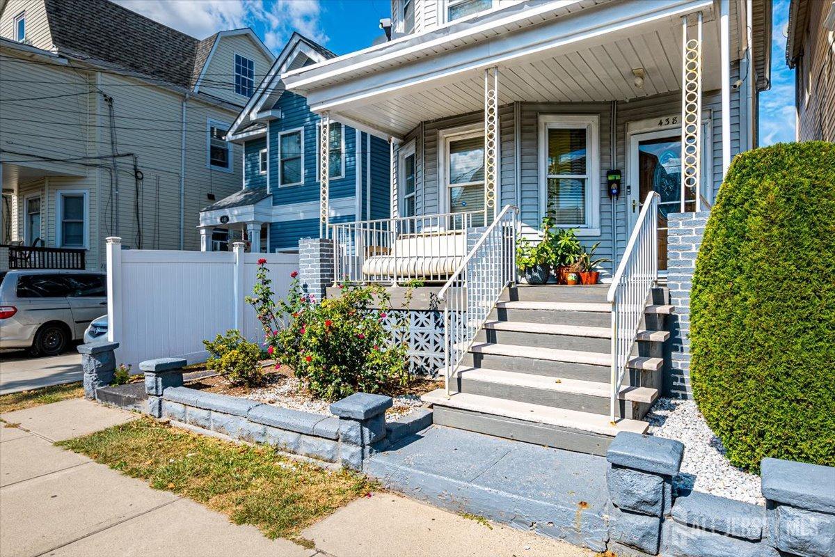 438 Lawrie Street Perth Amboy, NJ 08861 - Photo 14 of 49 a front view of a house with plants
