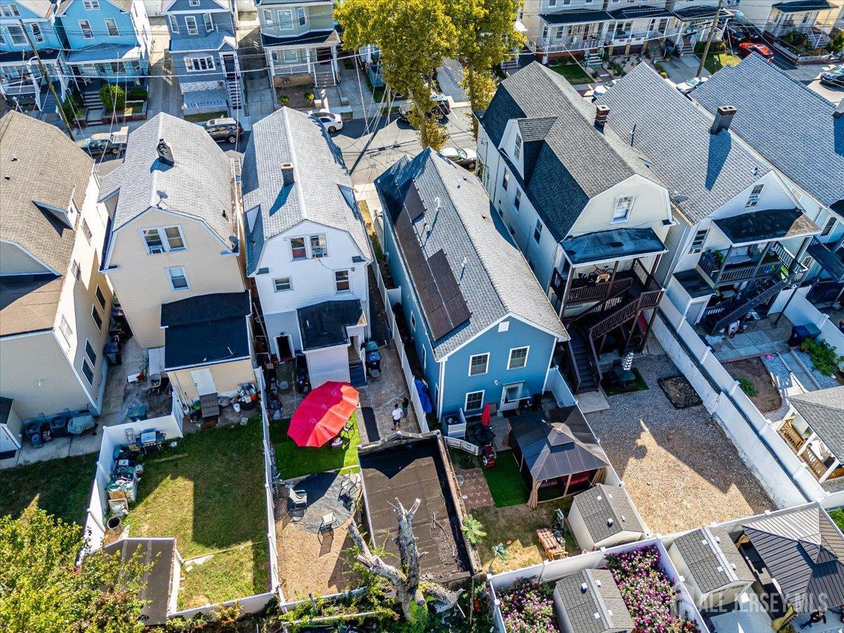 438 Lawrie Street Perth Amboy, NJ 08861 - Photo 39 of 49 an aerial view of multi story residential apartment building with yard