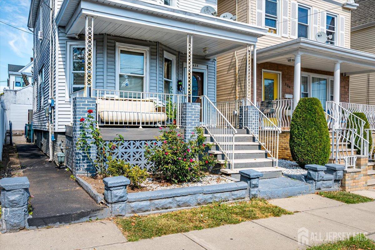 438 Lawrie Street Perth Amboy, NJ 08861 - Photo 4 of 49 a front view of a house