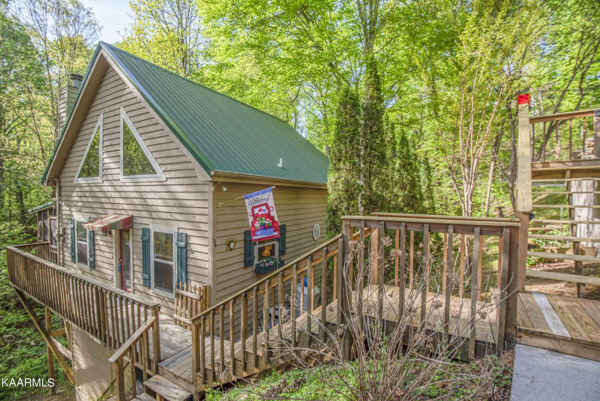 106 Club View Road Townsend, TN 37882 - Photo 1 of 55 a view of balcony with wooden floor and fence