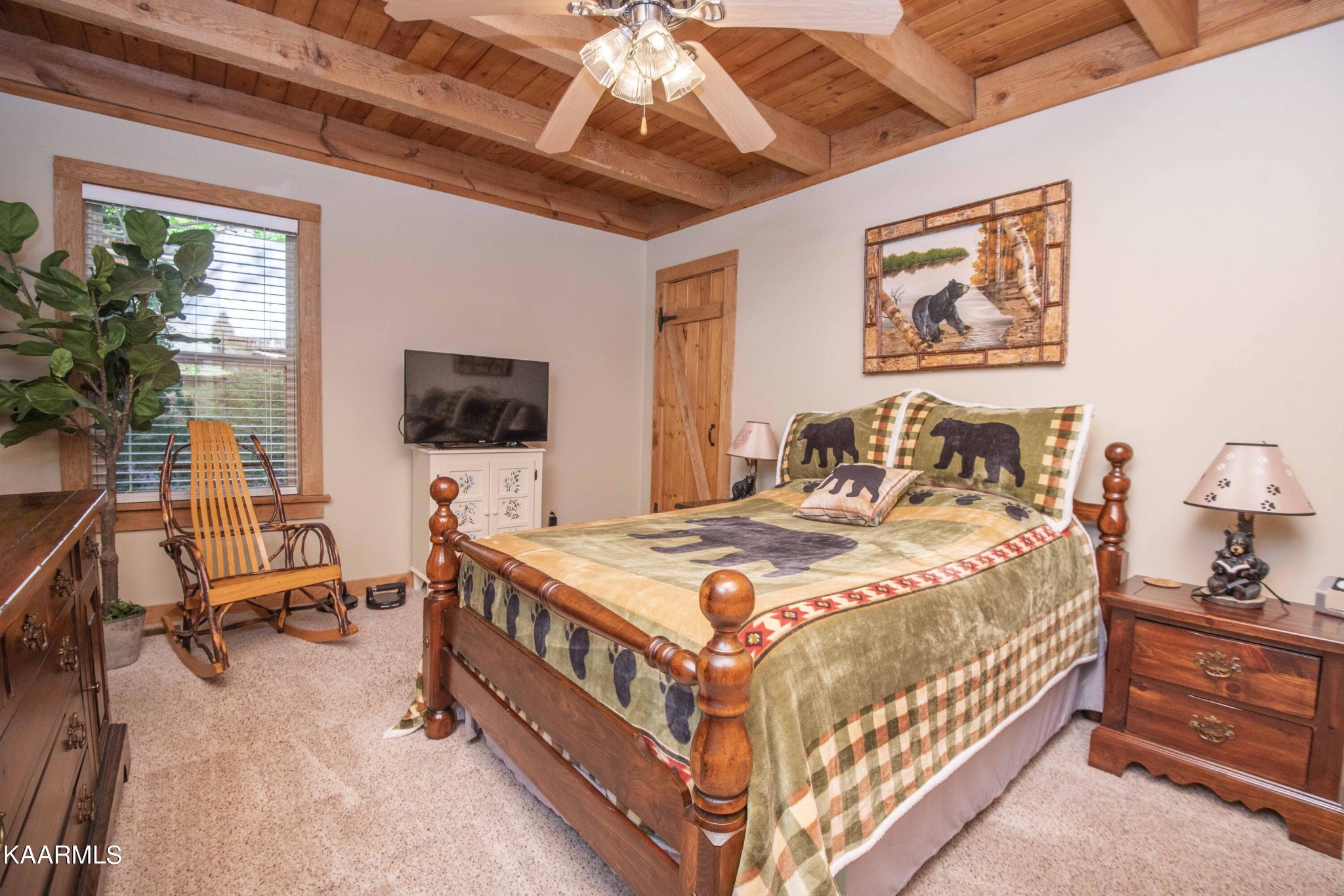106 Club View Road Townsend, TN 37882 - Photo 20 of 55 a bedroom with a bed and a flat screen tv