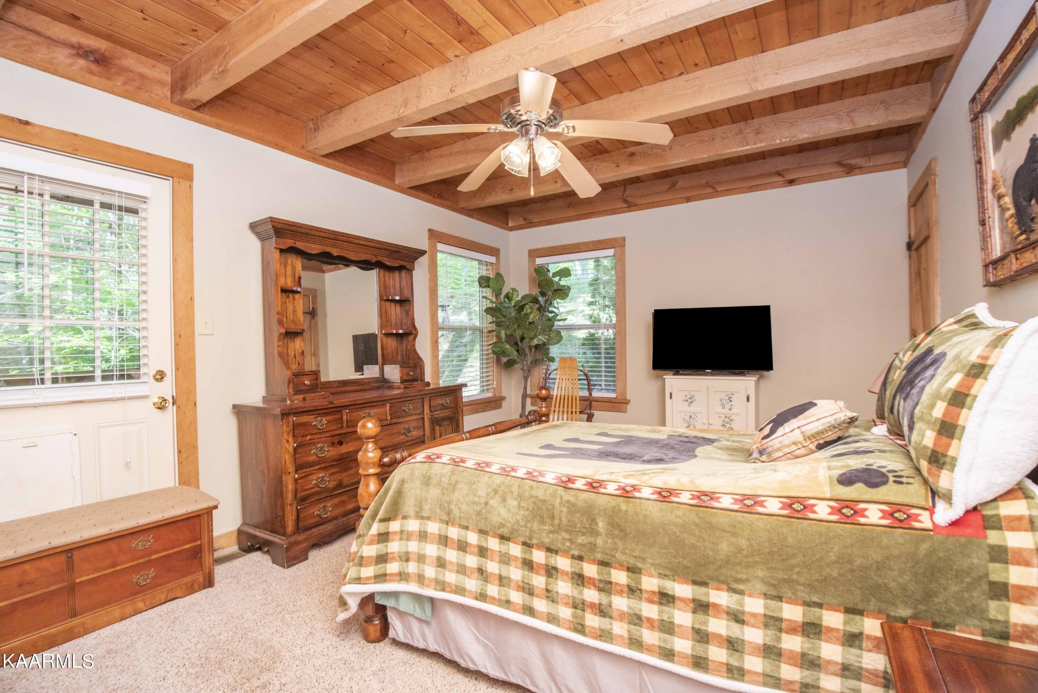 106 Club View Road Townsend, TN 37882 - Photo 21 of 55 a bedroom with a bed and a flat screen tv