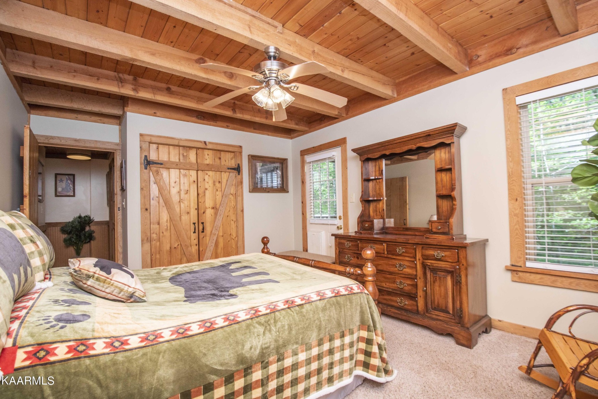 106 Club View Road Townsend, TN 37882 - Photo 22 of 55 a bedroom with a bed dresser and a large window