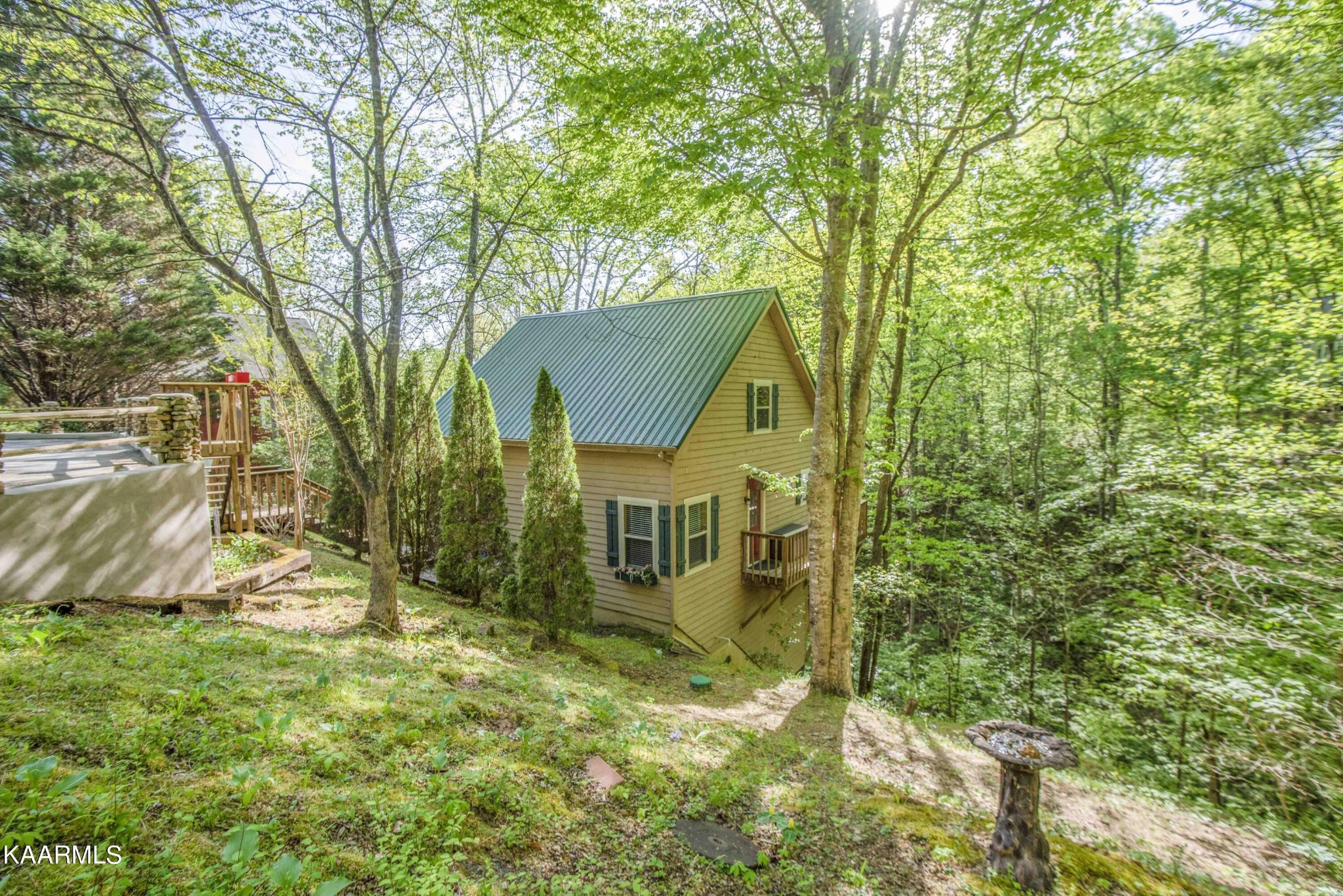 106 Club View Road Townsend, TN 37882 - Photo 35 of 55 front view of a house with a yard