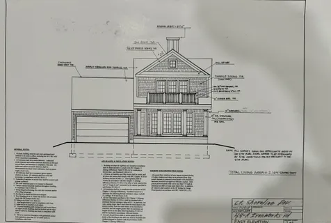 a view of a road with a trees in the background