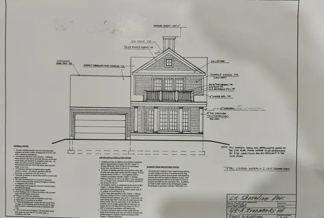 a view of a road with a trees in the background