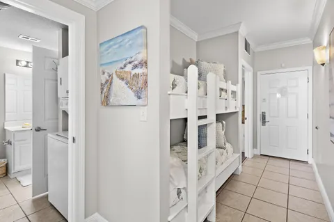 a spacious bathroom with a glass shower door and a sink