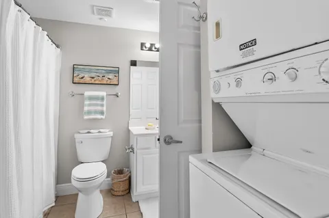 a bathroom with a toilet and a sink