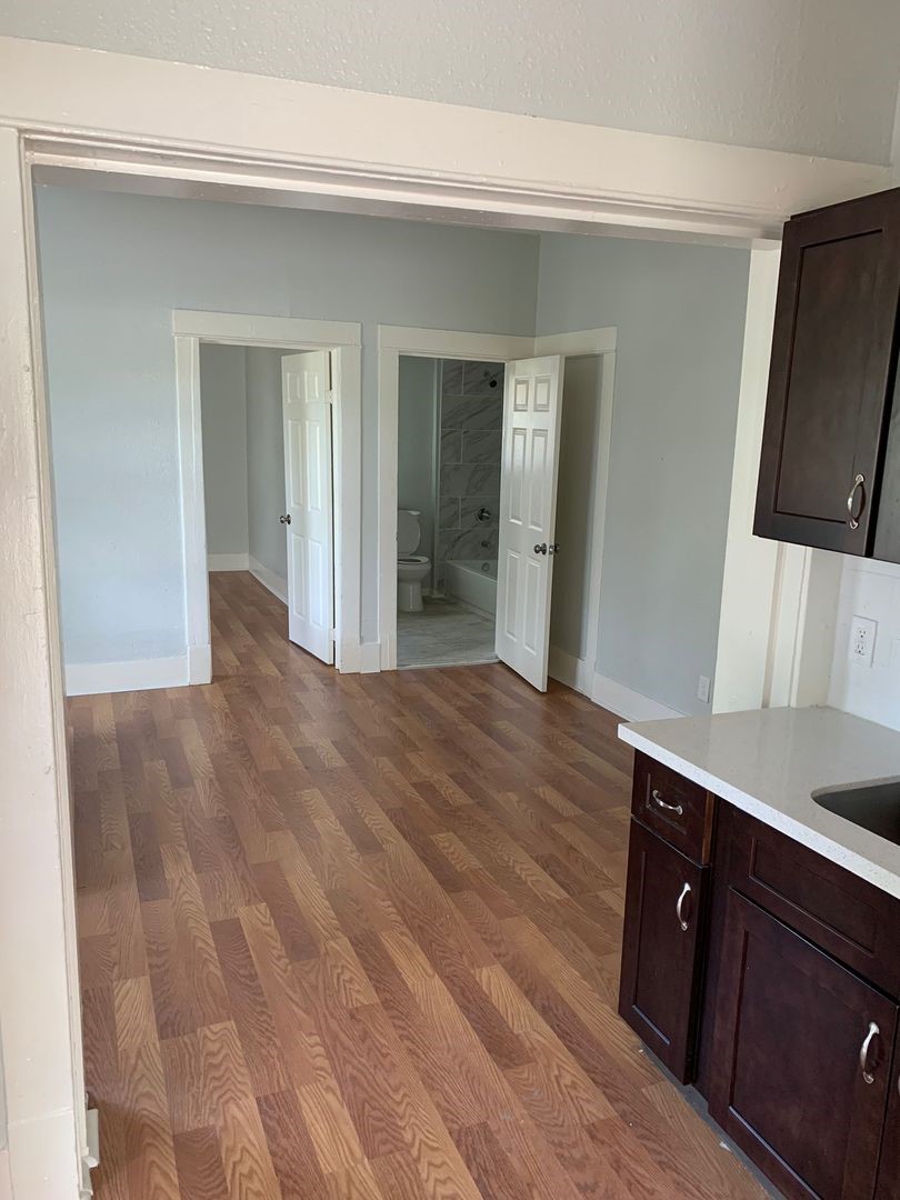 1294 Cartwright Street Beaumont, TX 77701 - Photo 4 of 6 a view of a kitchen from the hallway