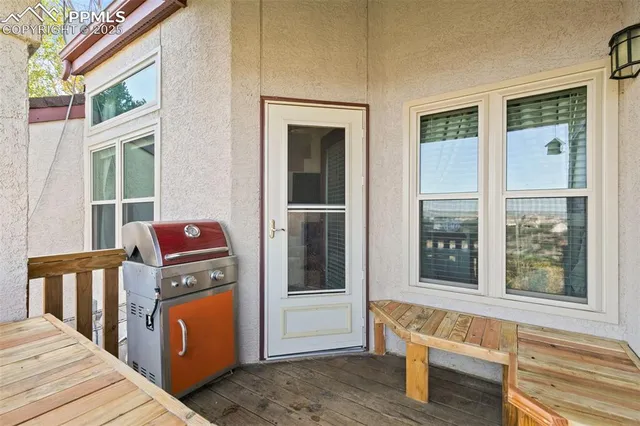 a view of a balcony with city view