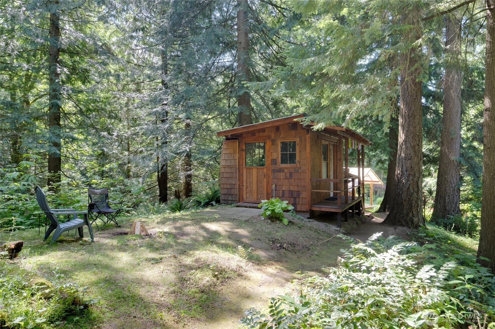 4315 Nordum Road Everson, WA 98247 - Photo 20 of 40 a backyard of a house with table and chairs