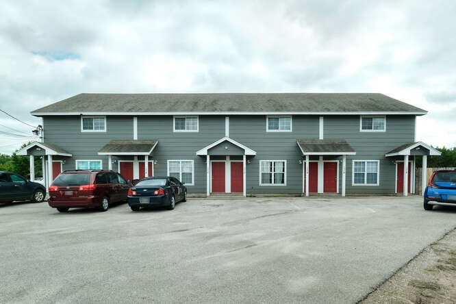 a car parked in front of a house