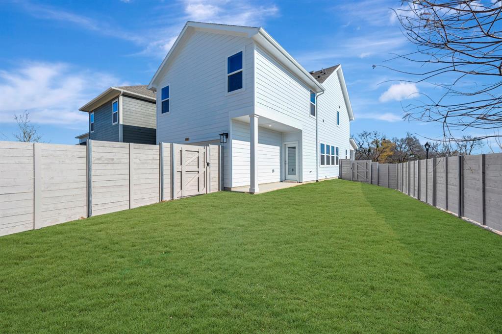 3501 Pineda Way McKinney, TX 75071 - Photo 2 of 40 a view of a backyard with wooden fence