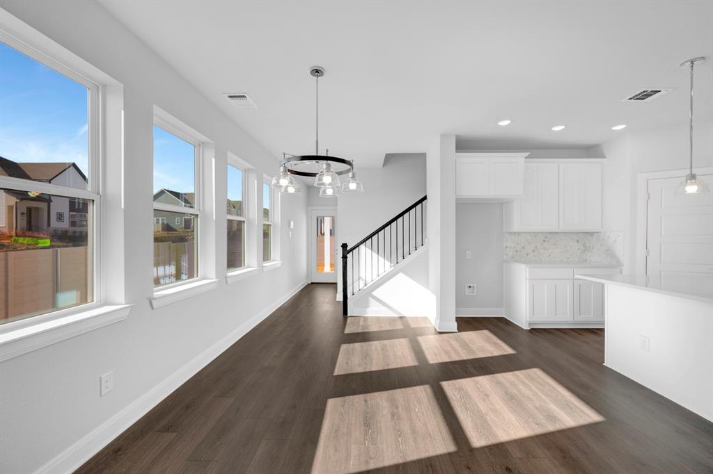 3501 Pineda Way McKinney, TX 75071 - Photo 25 of 40 a view of entryway and hall with wooden floor