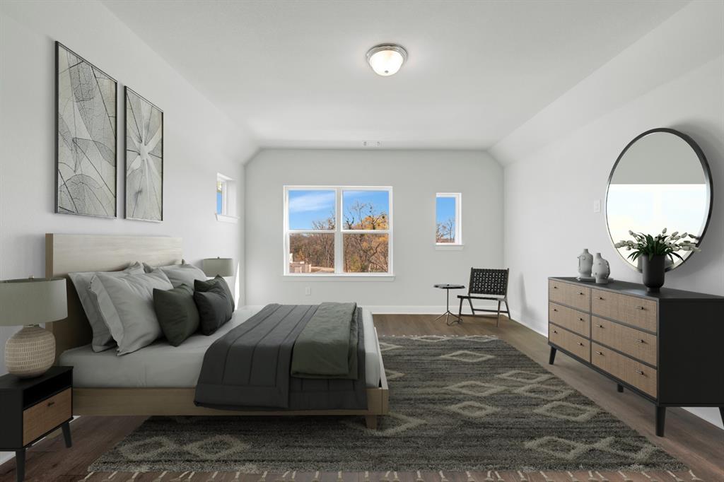 3501 Pineda Way McKinney, TX 75071 - Photo 3 of 40 a bedroom with a large bed and wooden floor