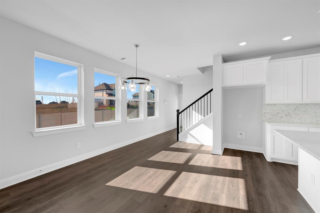 3501 Pineda Way McKinney, TX 75071 - Photo 6 of 40 a view of an entryway with wooden floor
