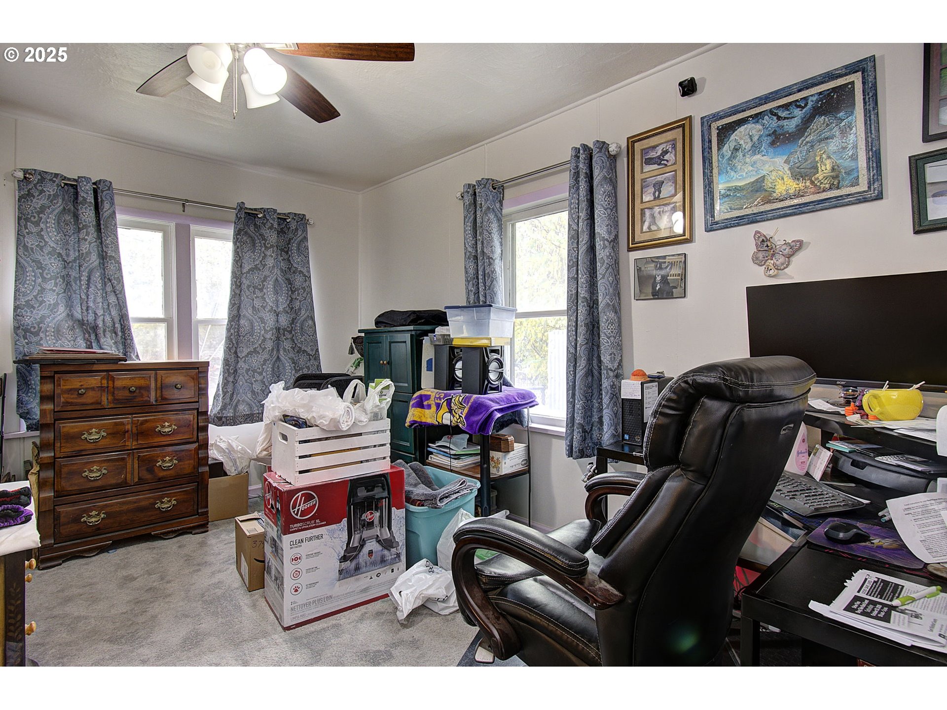 409 Main Street Klickitat, WA 98628 - Photo 16 of 35 a living room with furniture and a flat screen tv