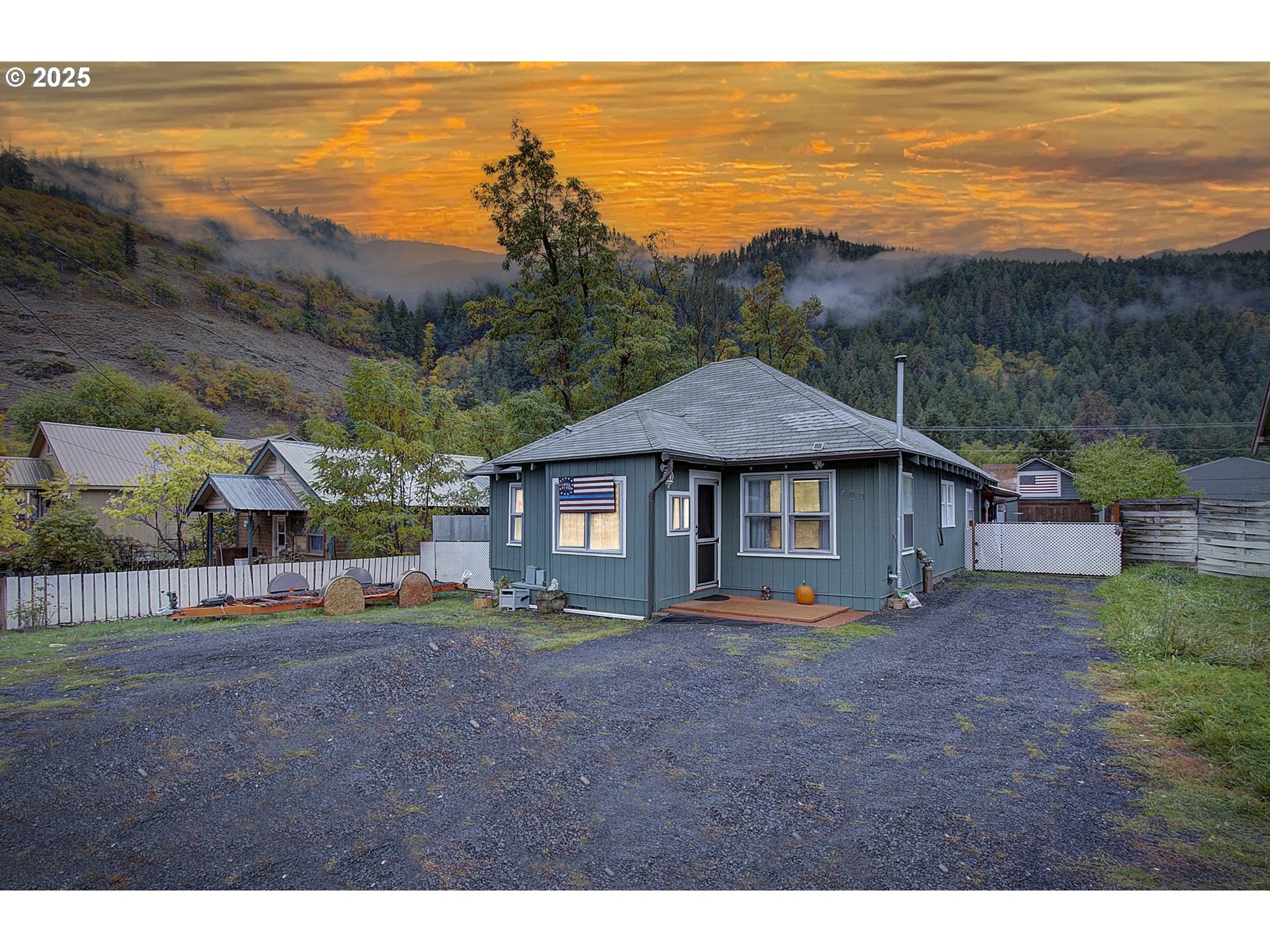 409 Main Street Klickitat, WA 98628 - Photo 2 of 35 a view of a house with a garden space