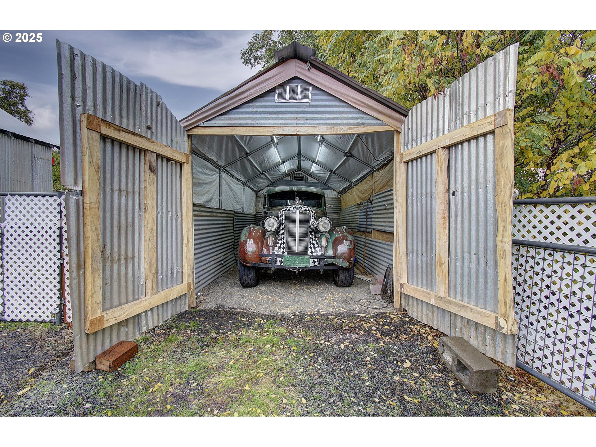 409 Main Street Klickitat, WA 98628 - Photo 21 of 35 a view of a house with wooden deck and furniture