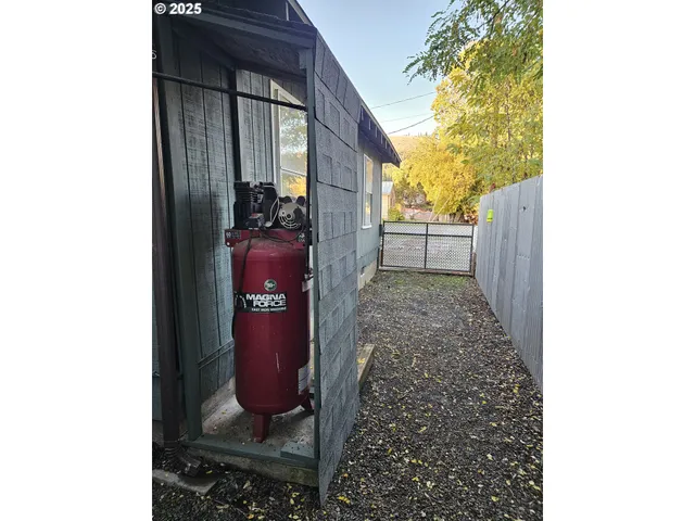 a view of street with parked cars