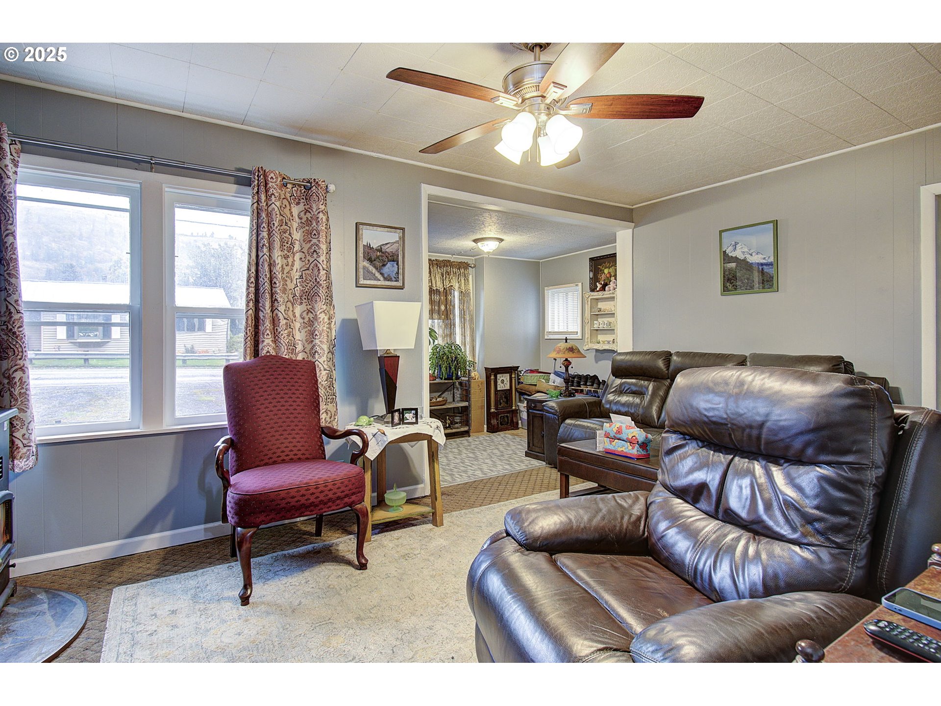 409 Main Street Klickitat, WA 98628 - Photo 6 of 35 a living room with furniture and a large window