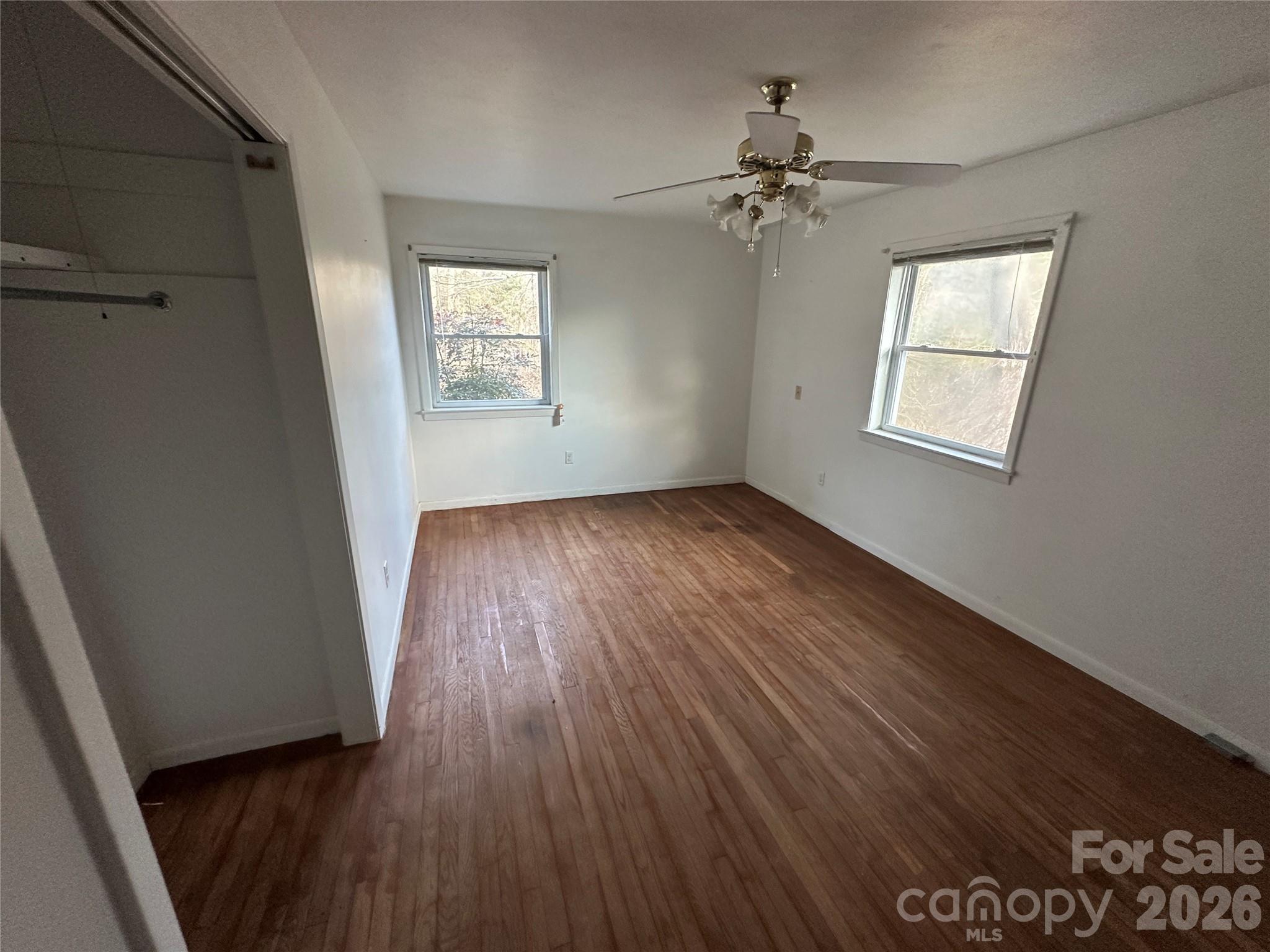 129 Ridgecrest Avenue Marble, NC 28905 - Photo 19 of 24 wooden floor in an empty room with a window