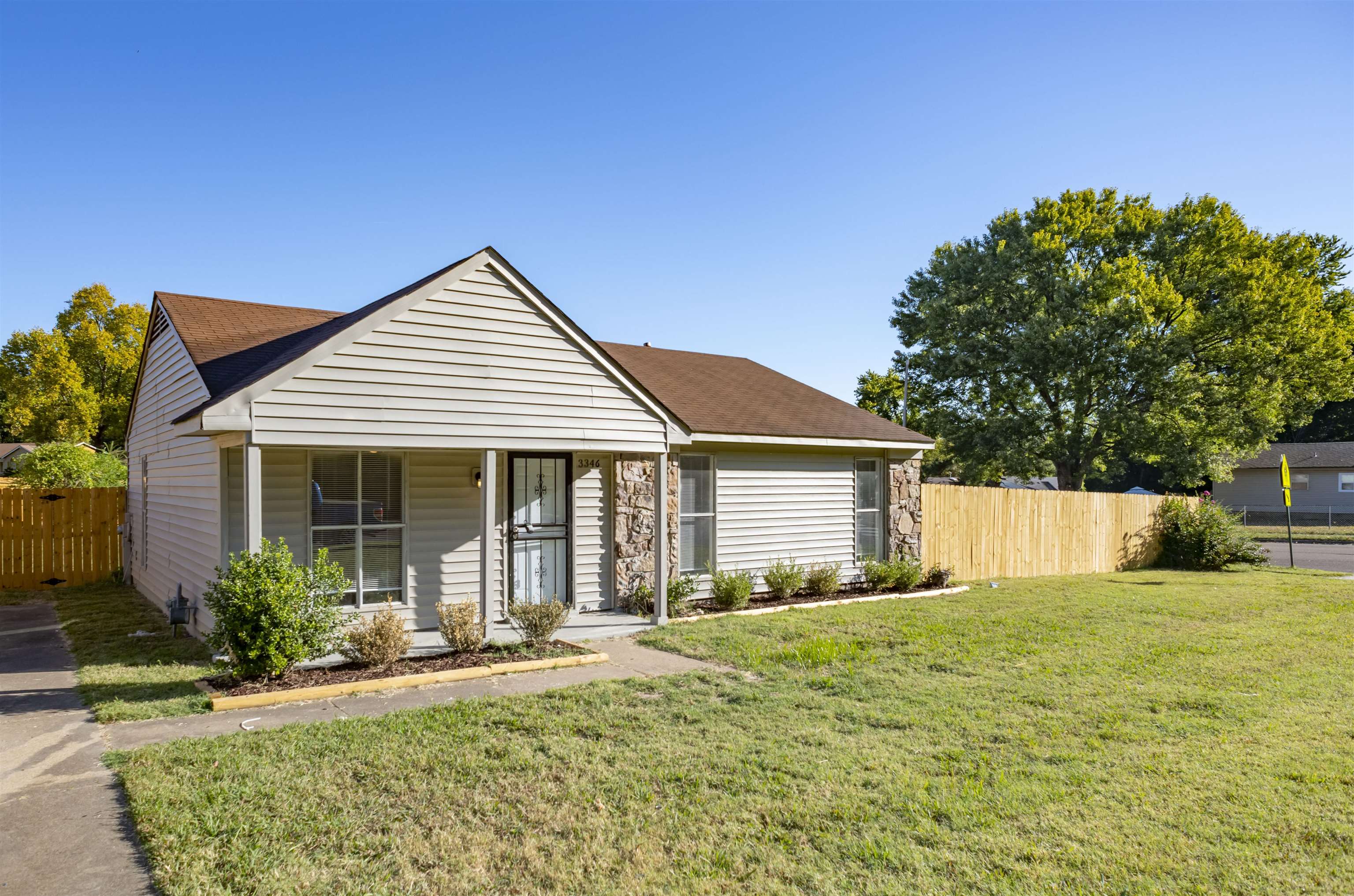 3346 Ridgemont Road Memphis, TN 38128 - Photo 11 of 12 a front view of house with yard and green space