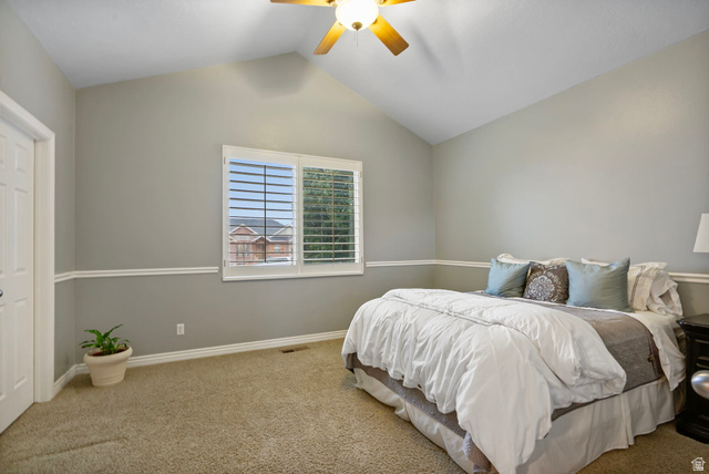 557 South 1470th Street East Springville, UT 84663 - Photo 19 of 46 Bedroom featuring vaulted ceiling, carpet flooring and ceiling fan