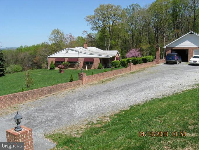 6541 Washington Monument Road Middletown, MD 21769 - Photo 3 of 7 a view of a out door of the house with green space