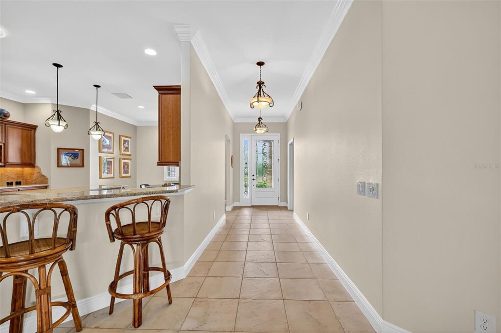 1850 Lake Ridge Drive The Villages, FL 32162 - Photo 21 of 70 a view of a hallway with furniture and windows