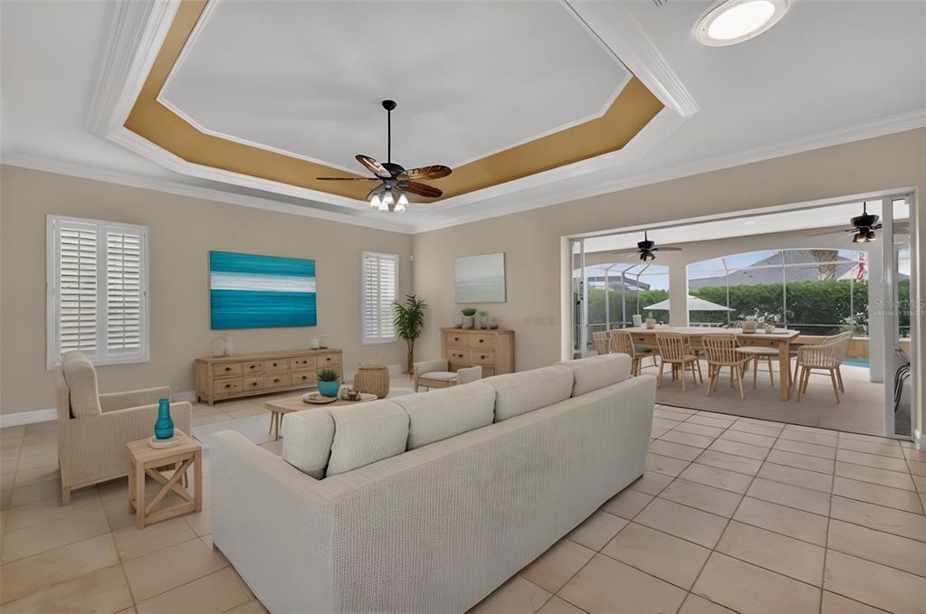 1850 Lake Ridge Drive The Villages, FL 32162 - Photo 24 of 70 a living room with furniture and a large window