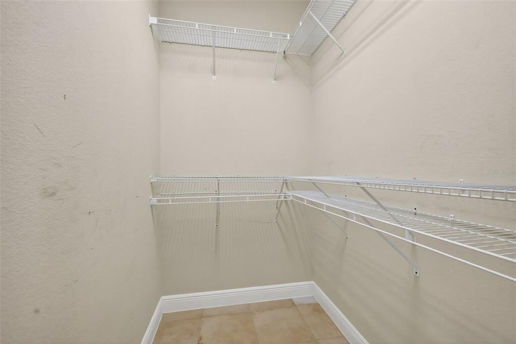 1850 Lake Ridge Drive The Villages, FL 32162 - Photo 42 of 70 a view of a room with racks on the wall