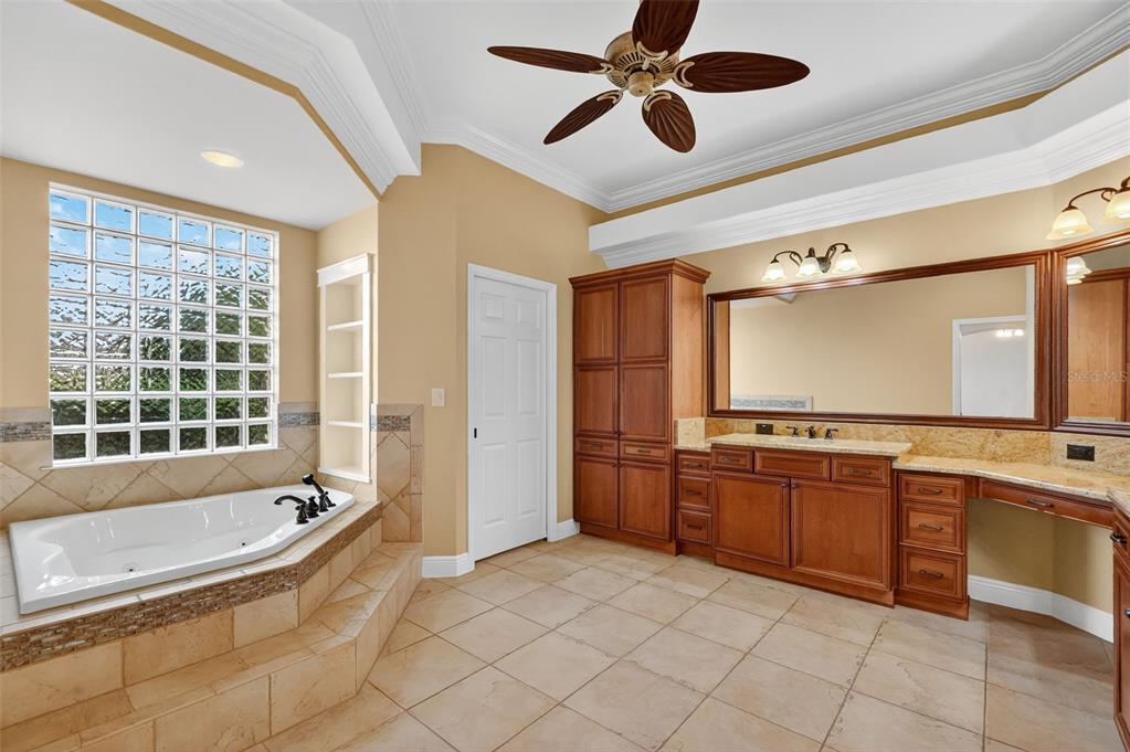 1850 Lake Ridge Drive The Villages, FL 32162 - Photo 43 of 70 a large spacious bathroom with a large tub shower and sink