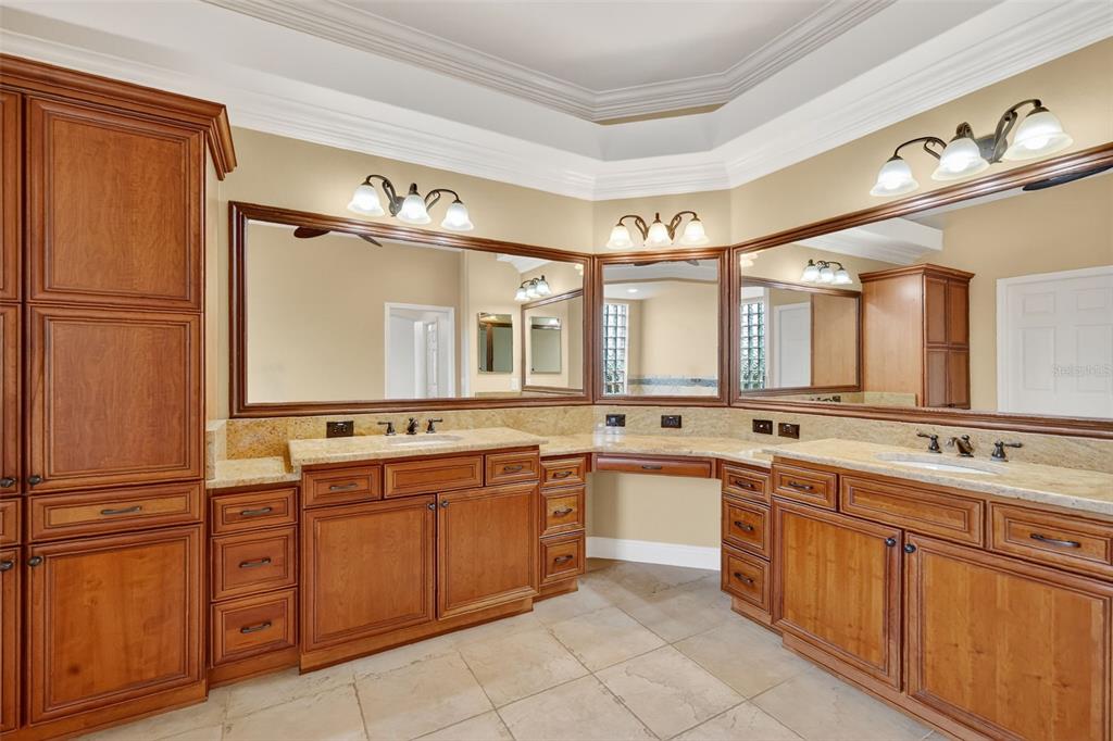 1850 Lake Ridge Drive The Villages, FL 32162 - Photo 44 of 70 a large kitchen with cabinets and stainless steel appliances