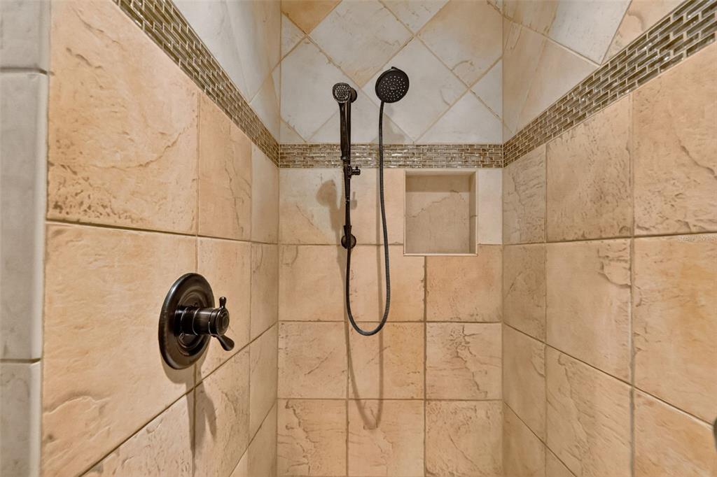 1850 Lake Ridge Drive The Villages, FL 32162 - Photo 46 of 70 a bathroom with a shower