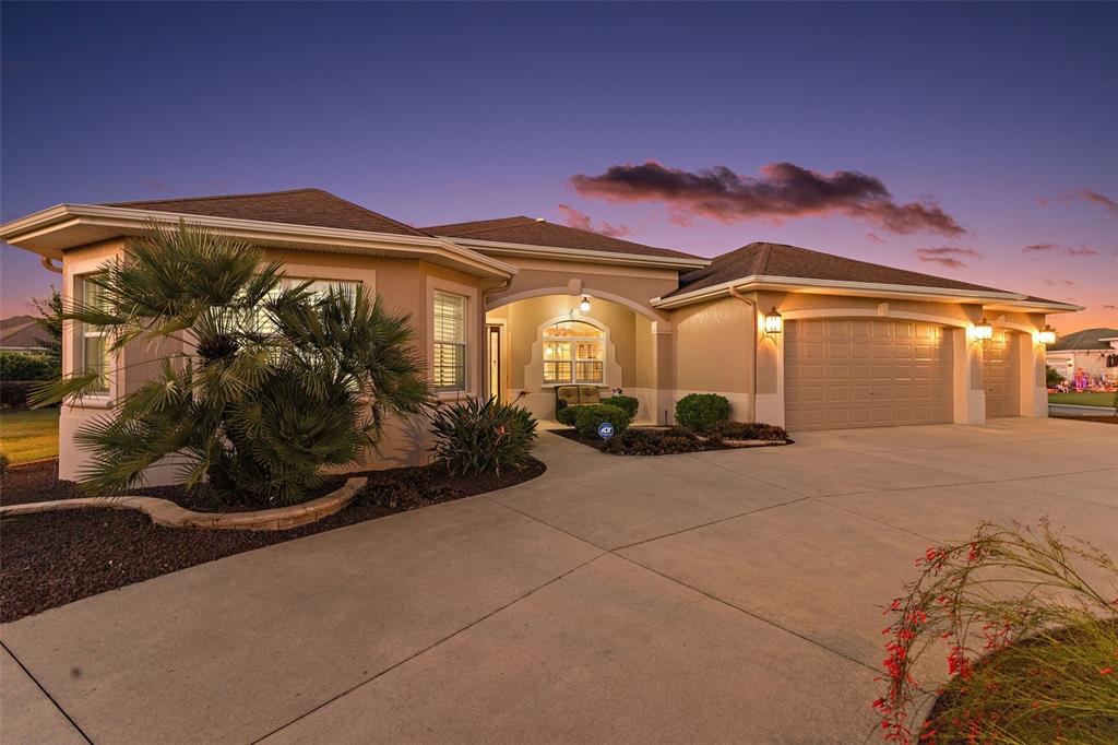 1850 Lake Ridge Drive The Villages, FL 32162 - Photo 58 of 70 a view of a house with a yard