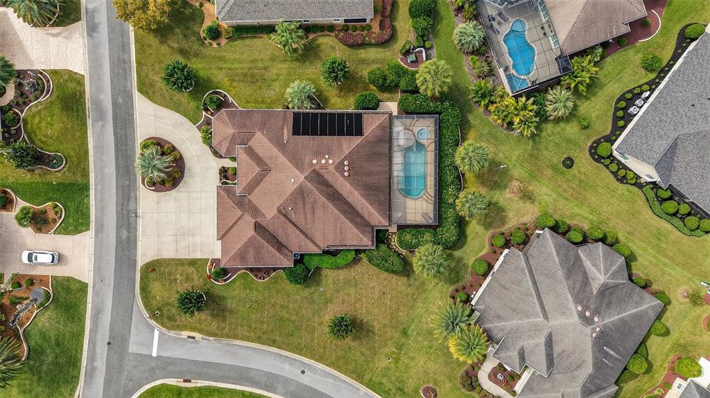 1850 Lake Ridge Drive The Villages, FL 32162 - Photo 62 of 70 an aerial view of a house with outdoor space and a lake view